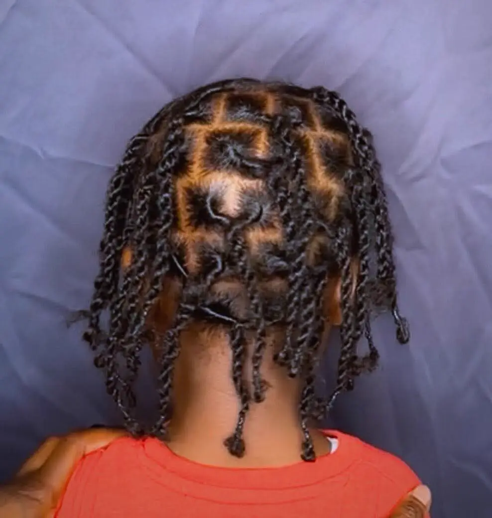 Knotless braid style with beads and detailed parting