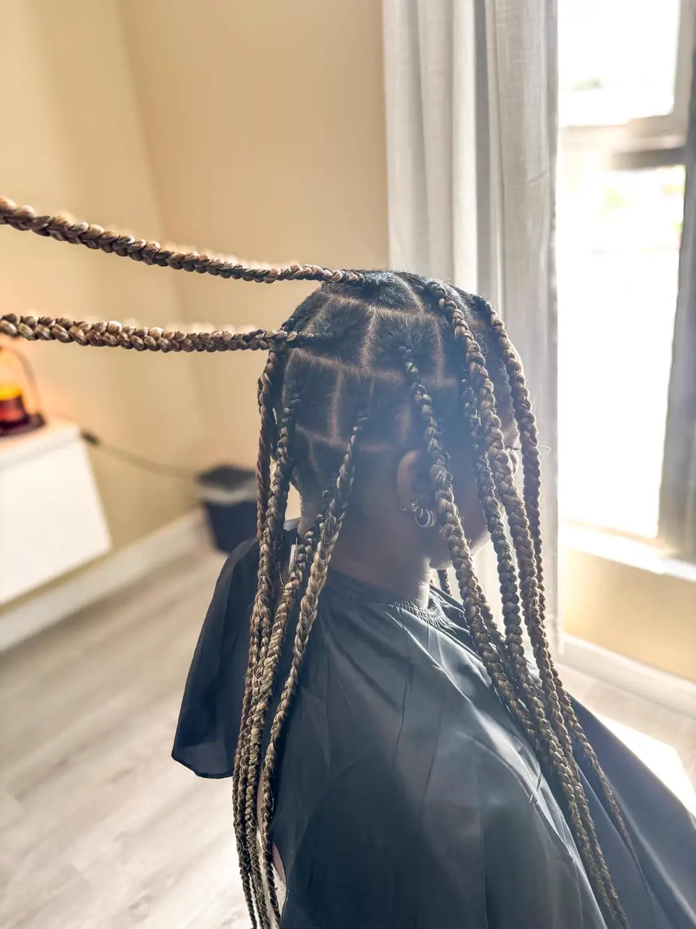 Long finished braids with sleek protective length