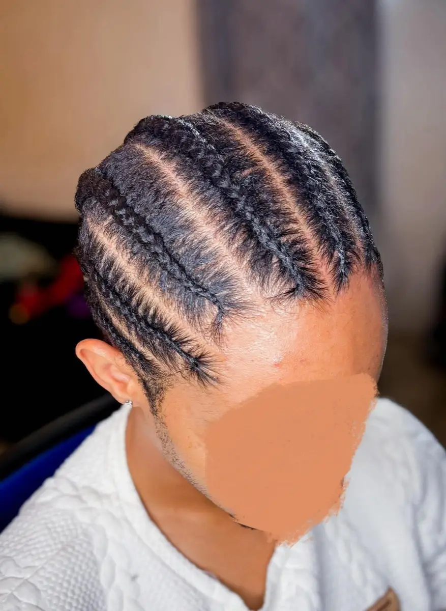 Close-up of neat braid rows and polished scalp finish